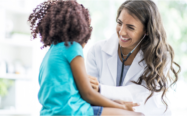 Nurse and child smiling