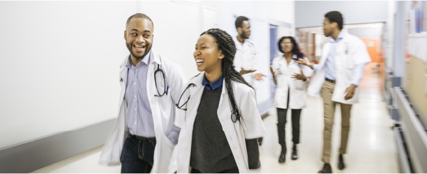 Group of doctors walking down a hallway